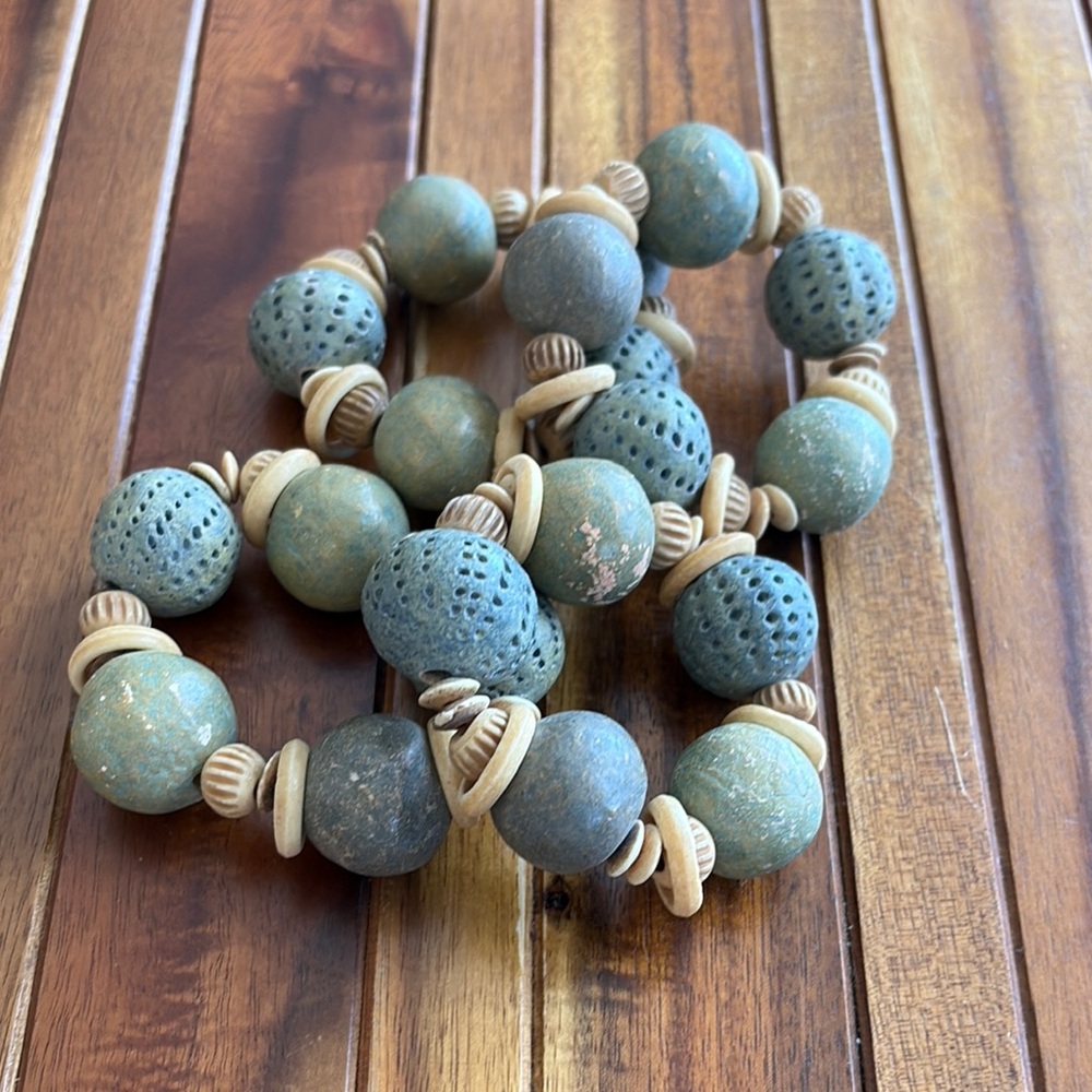 Green and Tan Beaded Wood Napkin Holder Rings with Intricate Details